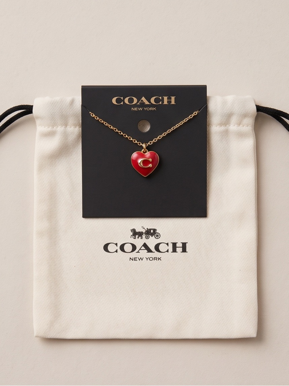 Coach Gold Chain with Red Heart 'C' Pendant